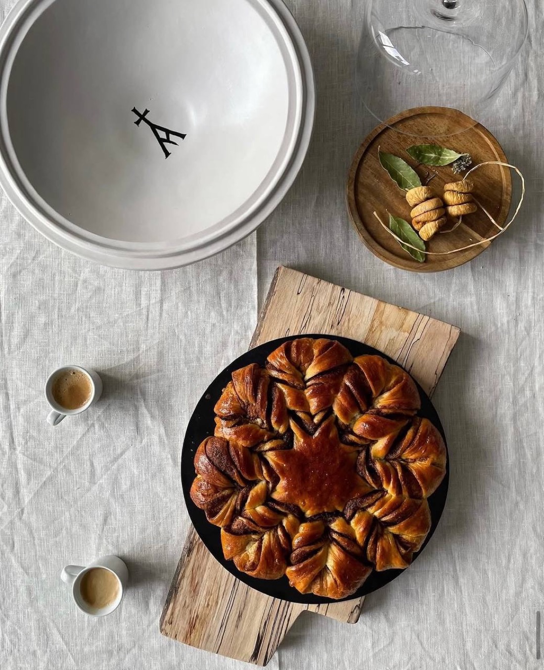 A star-shaped sweet bread on a dark plate