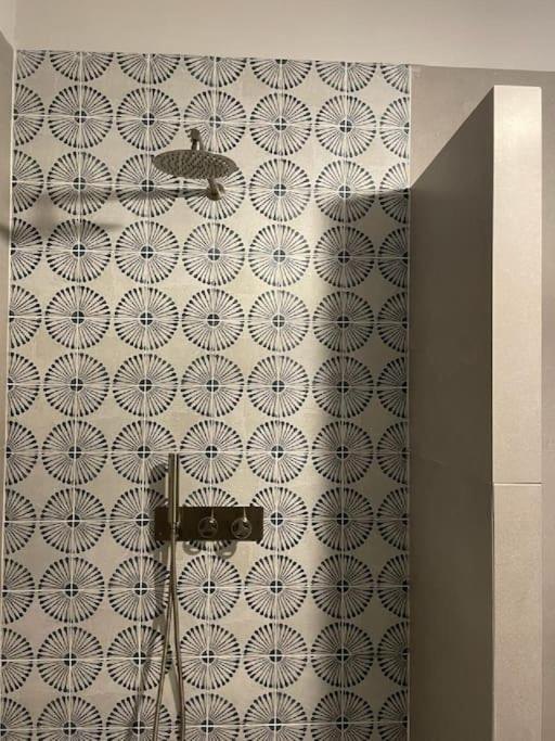 The patterned-tile shower